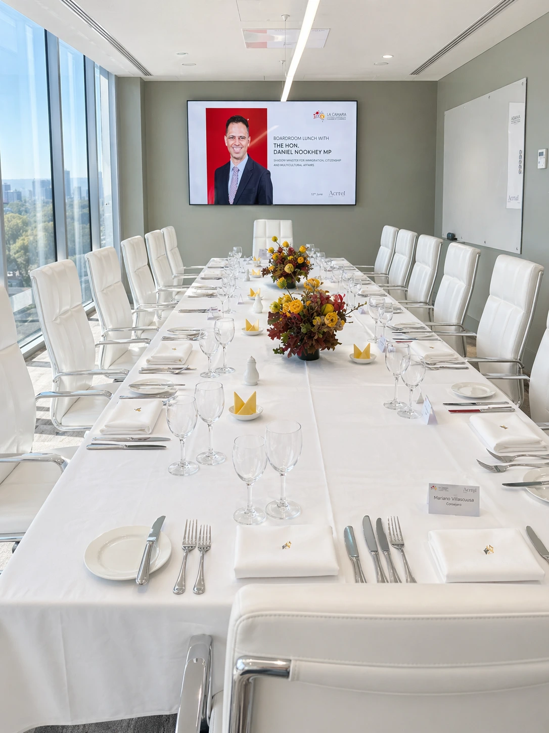 Corporate boardroom prepared for catered dining