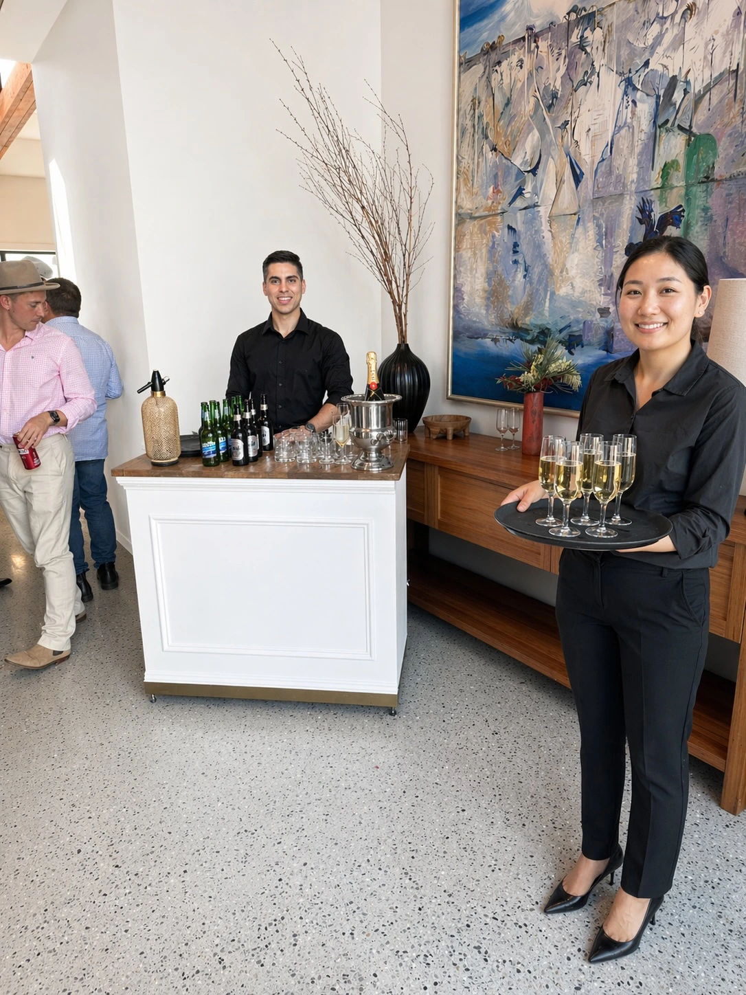 Ruffles staff serving drinks at an event